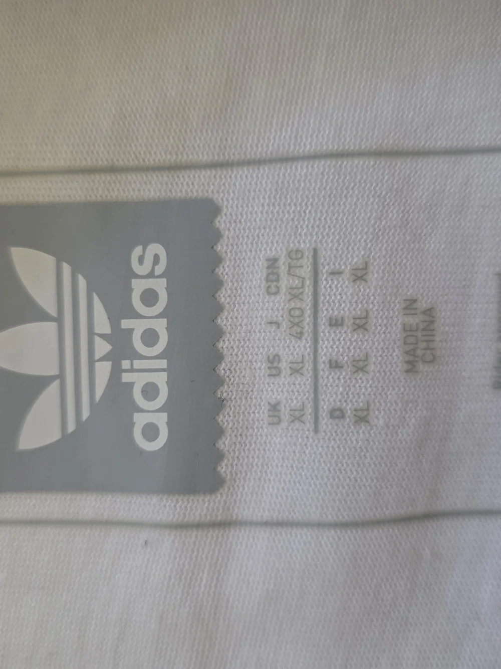 adidas White Short Sleeve Skateboarding Logo Tee with Red and Black Script